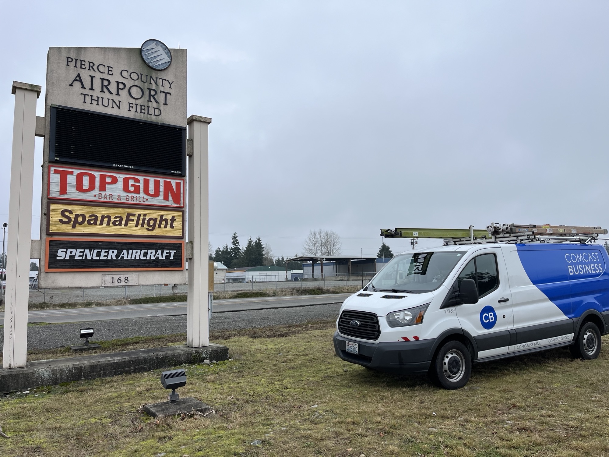 A Comcast Business truck parked at Thun Field.